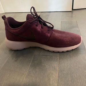 Purple Nike Roshe suede sneakers